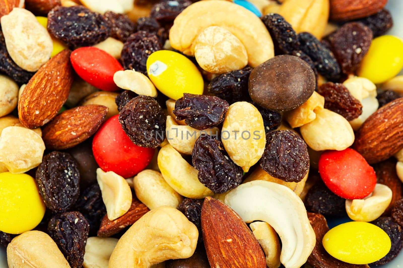 Set of nuts, almonds, cashews and raisins.