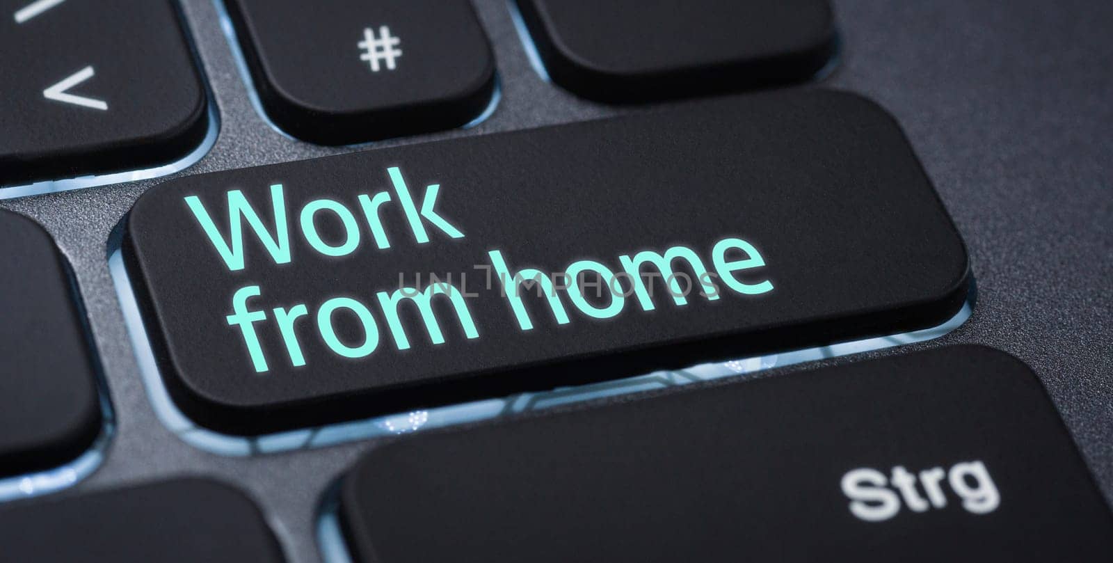 Illuminated keyboard with a labeled key - Work from home