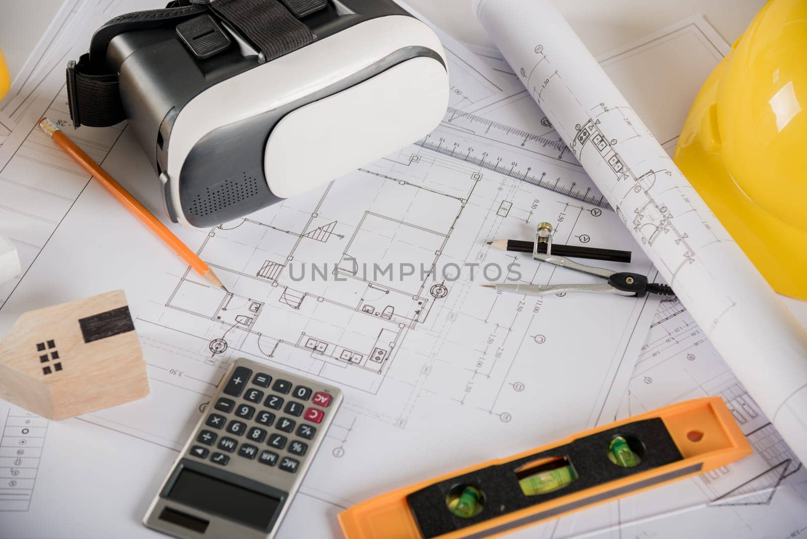 Architect workplace top view. Architectural blueprint paper project plans on desk table, tool for engineer contractor building design working drawing and VR glasses, industry virtual technology