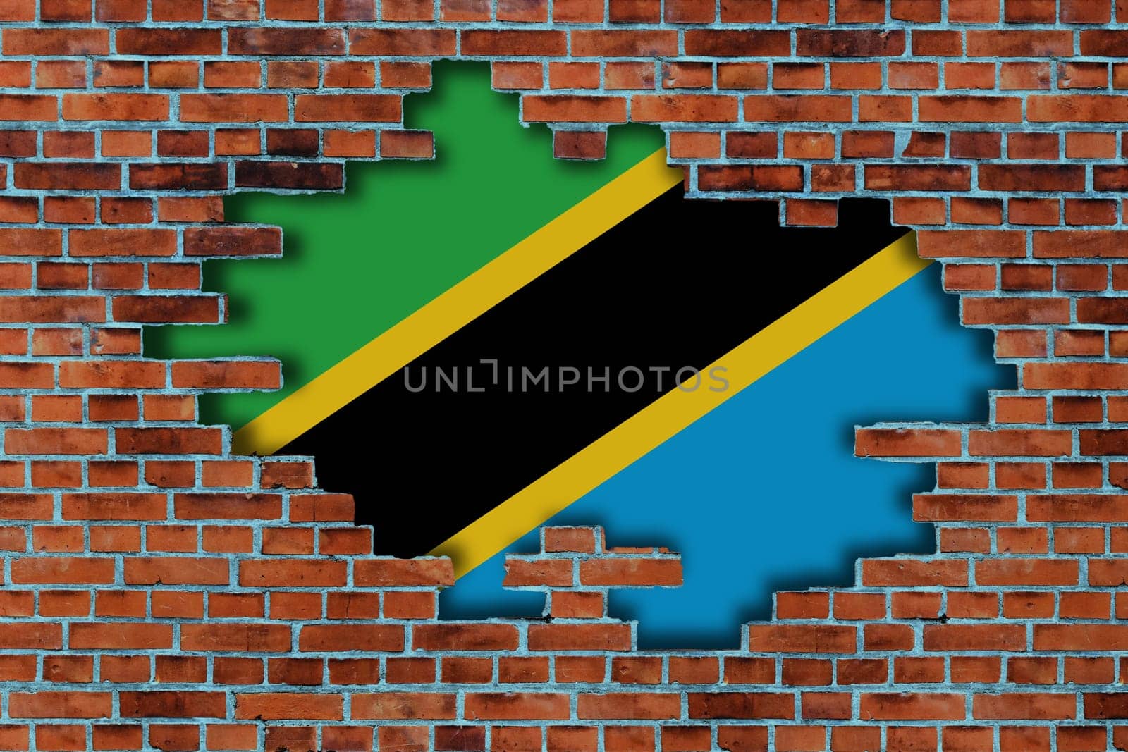 3D Flag of Tanzania behind the broken old stone wall background.