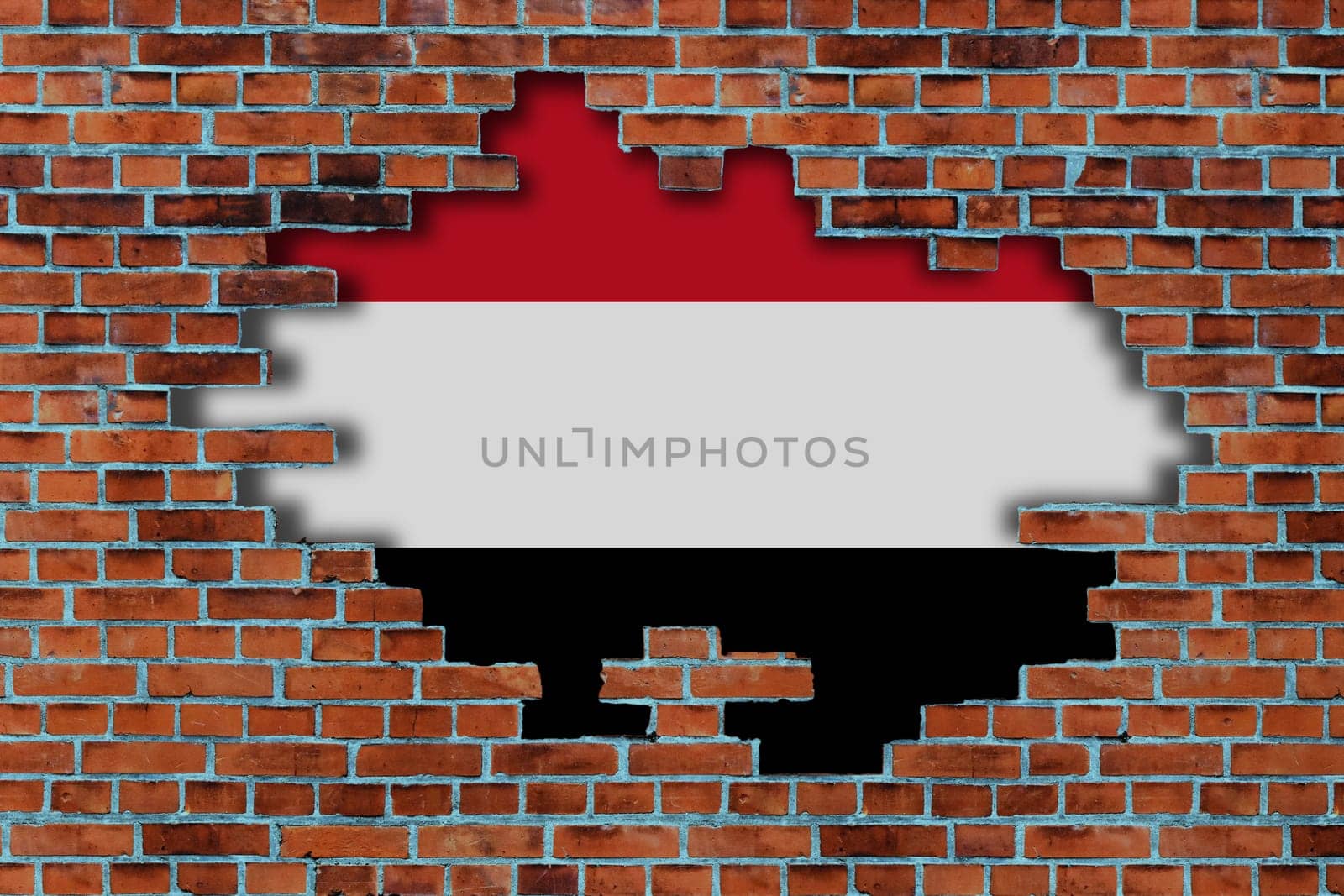 3D Flag of Yemen behind the broken old stone wall background.