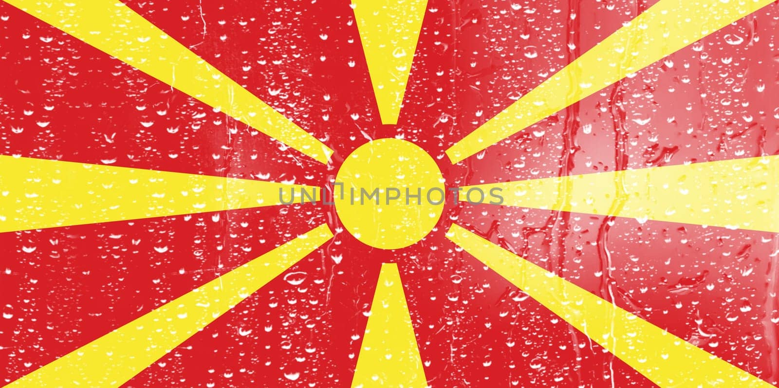 3D Flag of North Macedonia on a glass with water drop background.