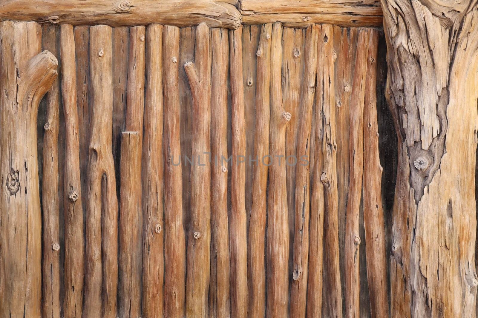 Brown wood texture background coming from natural tree. The wooden panel has a beautiful dark pattern, fence texture in daytime
