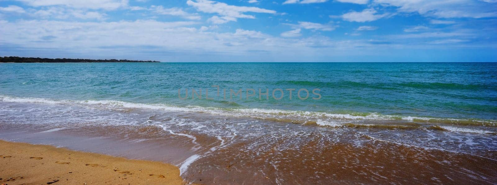 Panoramic view of the blue green waters of Hervey Bay at Pialba beach Queensland. Hervey Bay is a very popular tourist destination.