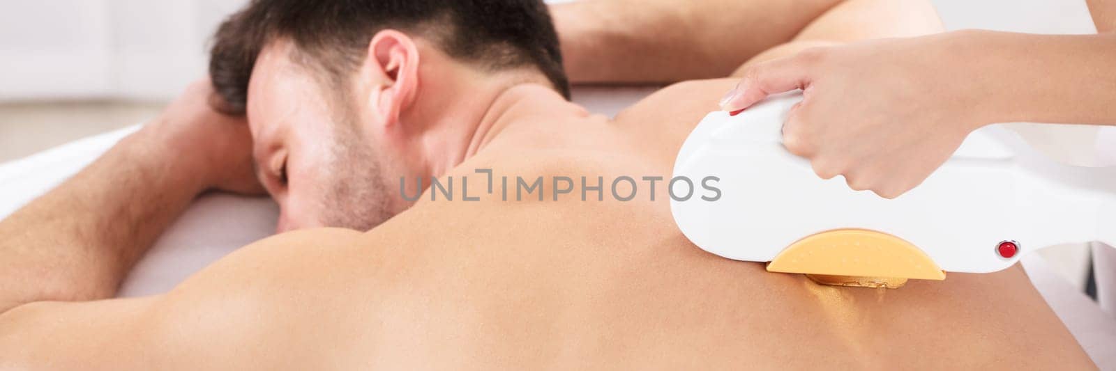 Hair Removal Cosmetology Procedure From A Therapist At Cosmetic Beauty Spa Clinic