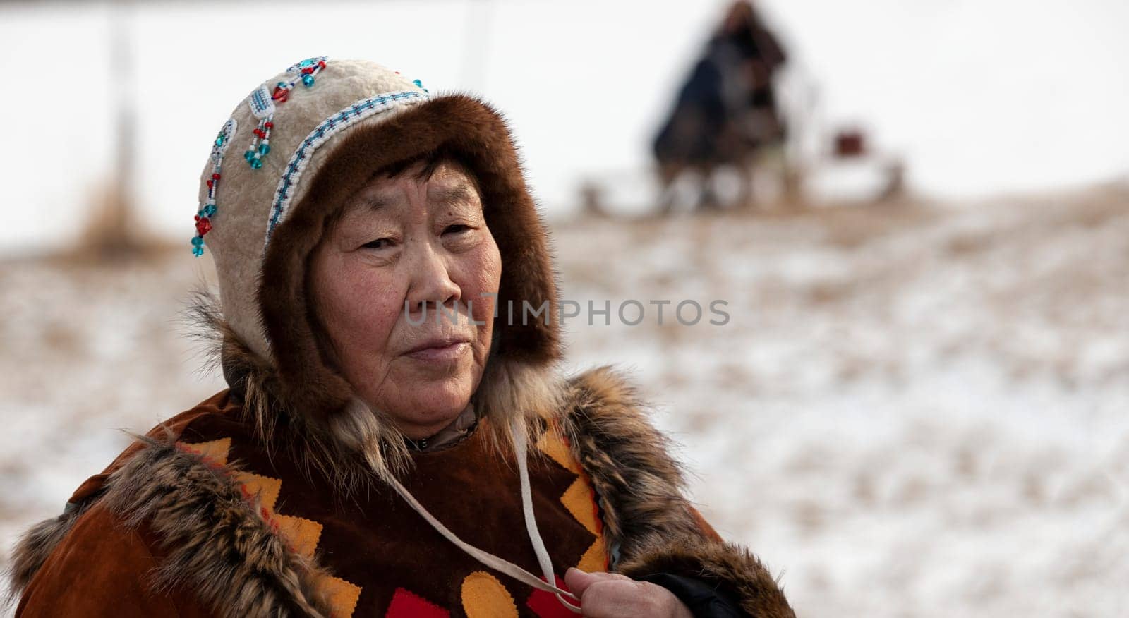 Kamchatka, Russia: 25 December, 2021: The woman in traditional Koryak dress on holiday Northern aboriginal Koryak was Hololo.