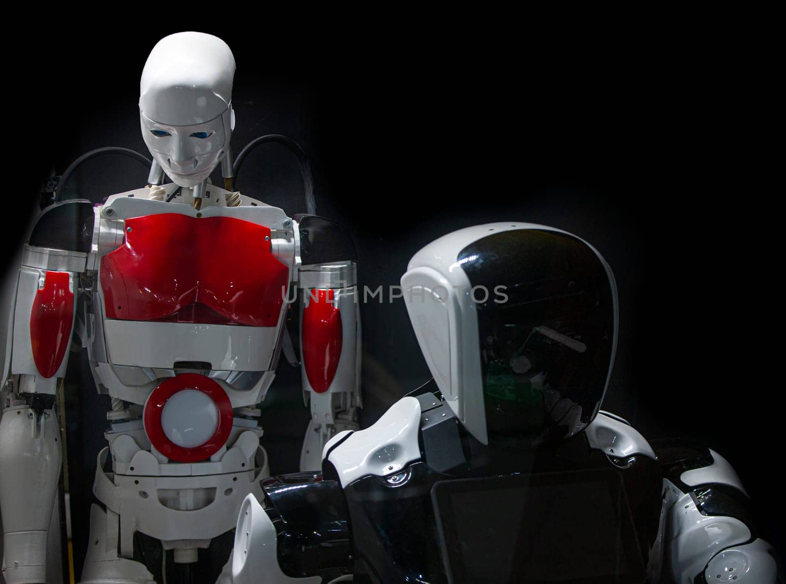 The ANDROID ROBOT made of modern materials on a black background
