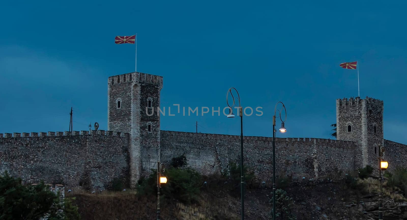 The evening city castle Skopje in Macedonia in the evening and street lamp. Selective focus