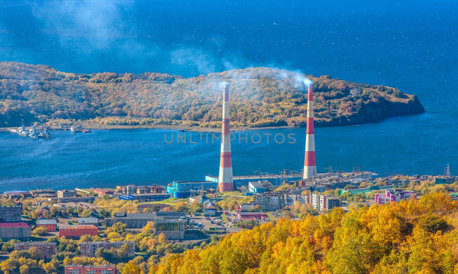 The Two striped pipes smoke of a power plant on Kamchatka peninsula