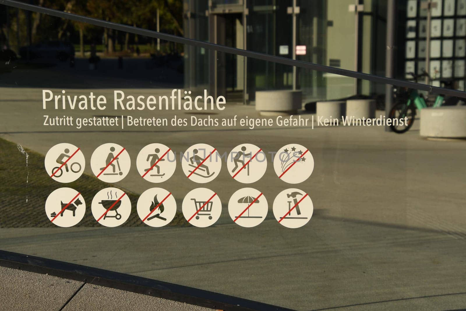 Prohibition sign for a private lawn with several prohibitions in Duesseldorf, Germany