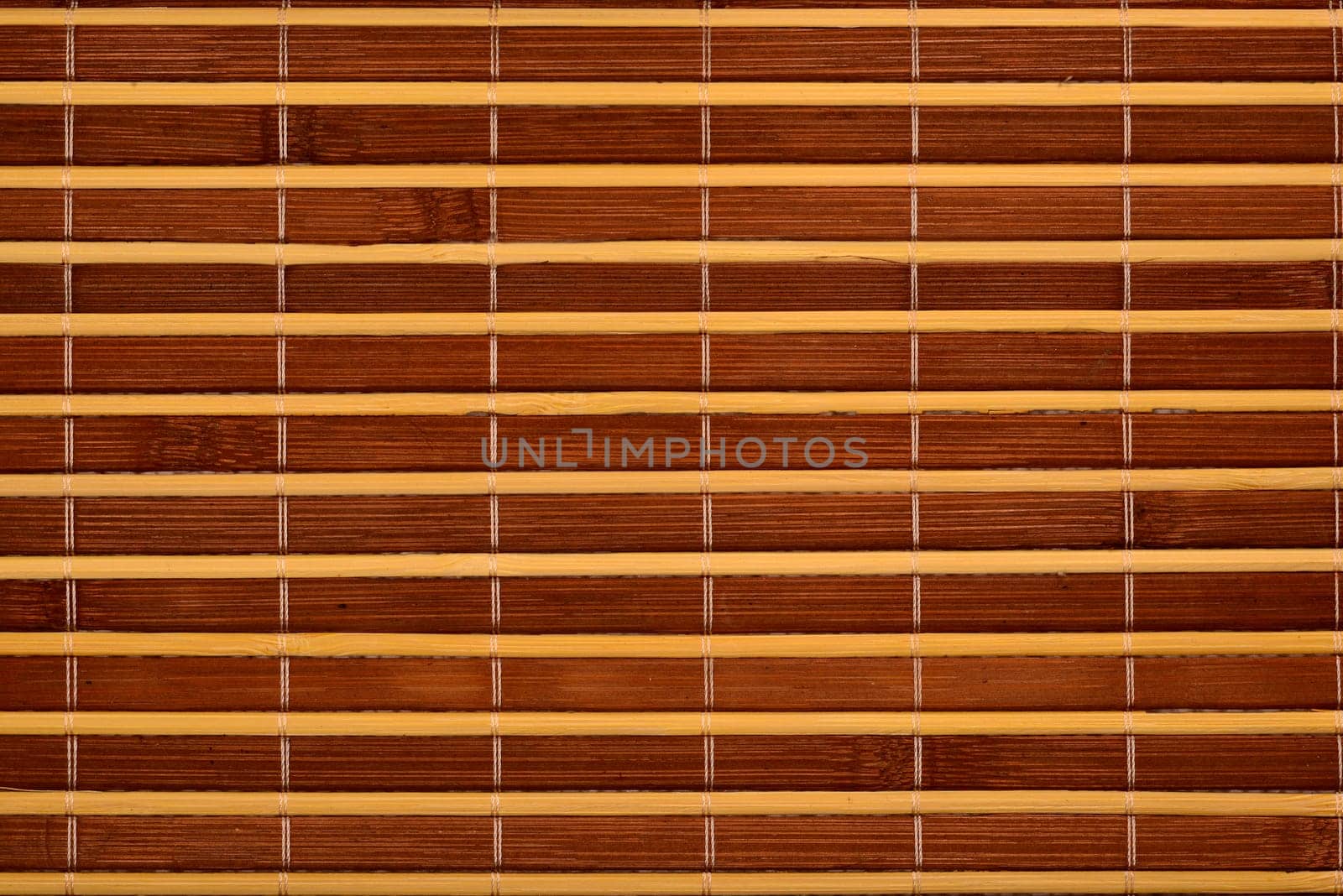 Brown bamboo mat with even pattern
