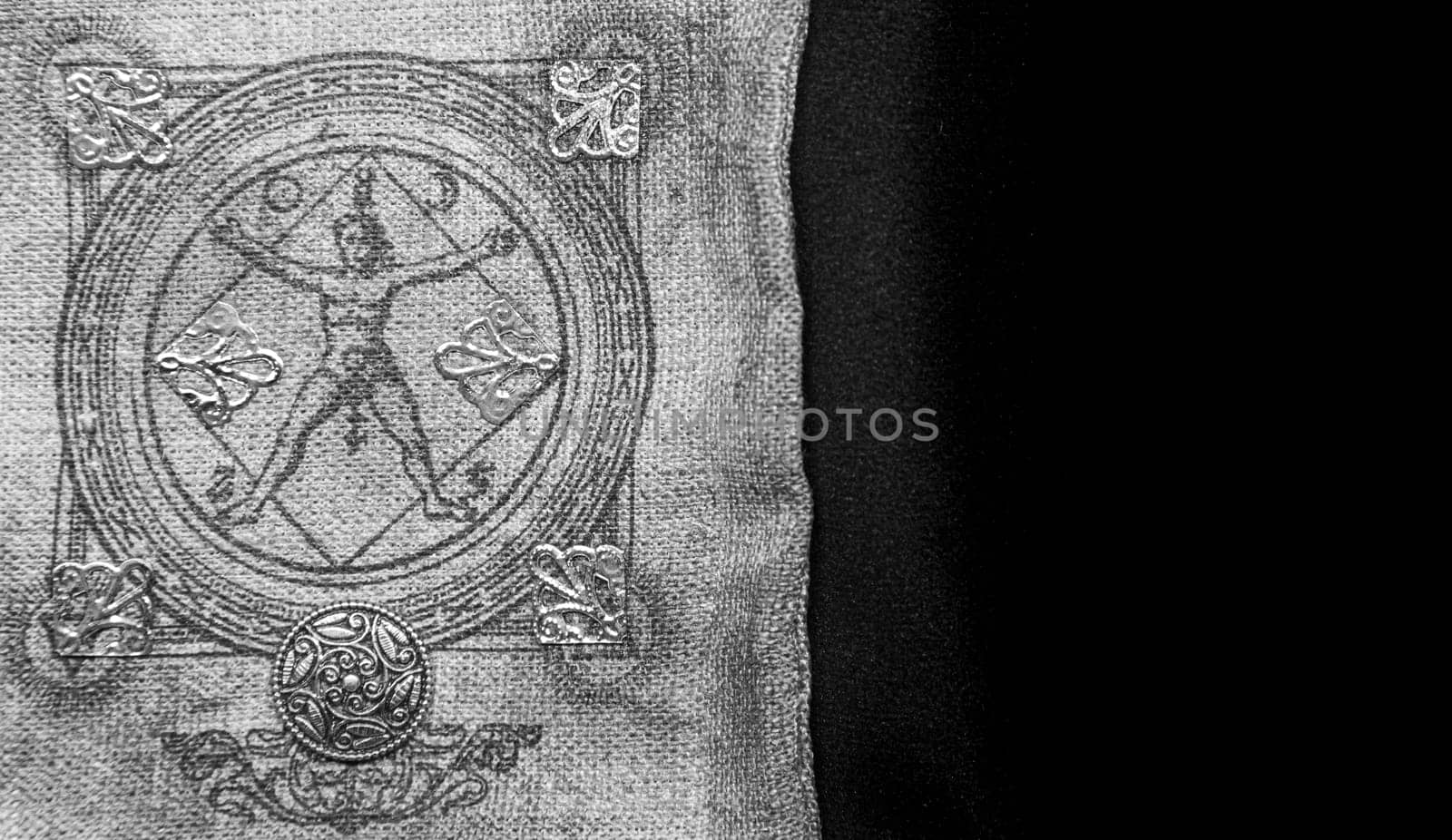 Ancient esoteric witchcraft background. Occultims and paganism old symbol, with mysterious runes and alphabet.
