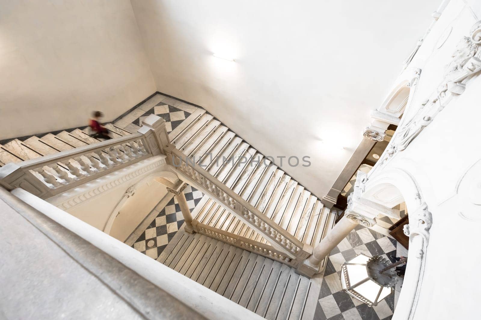 TURIN, ITALY - CIRCA MAY 2021: luxury staircase made of marble in an antique Italian palace
