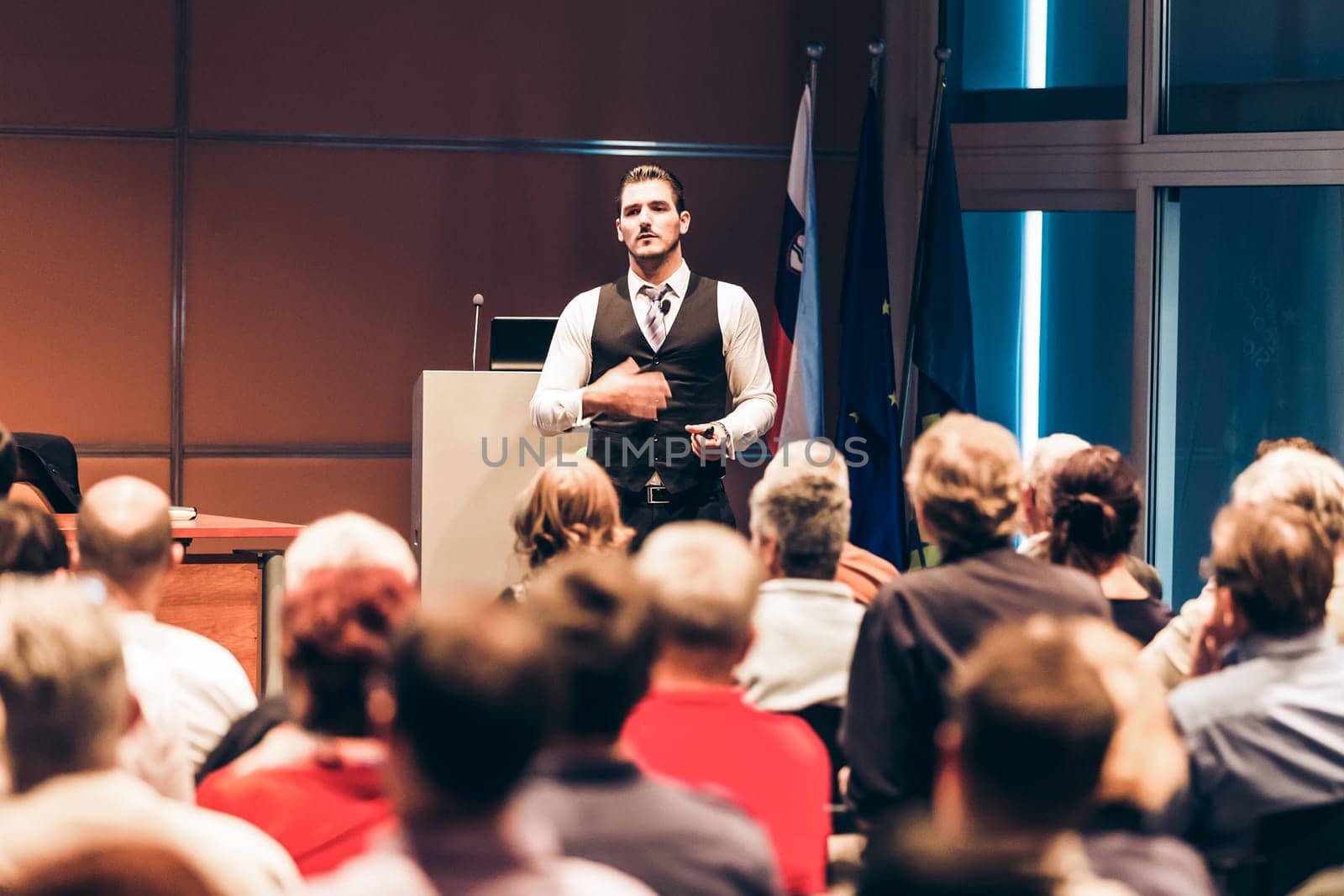 Speaker at Business Conference and Presentation. Audience at the conference hall. Business and Entrepreneurship.