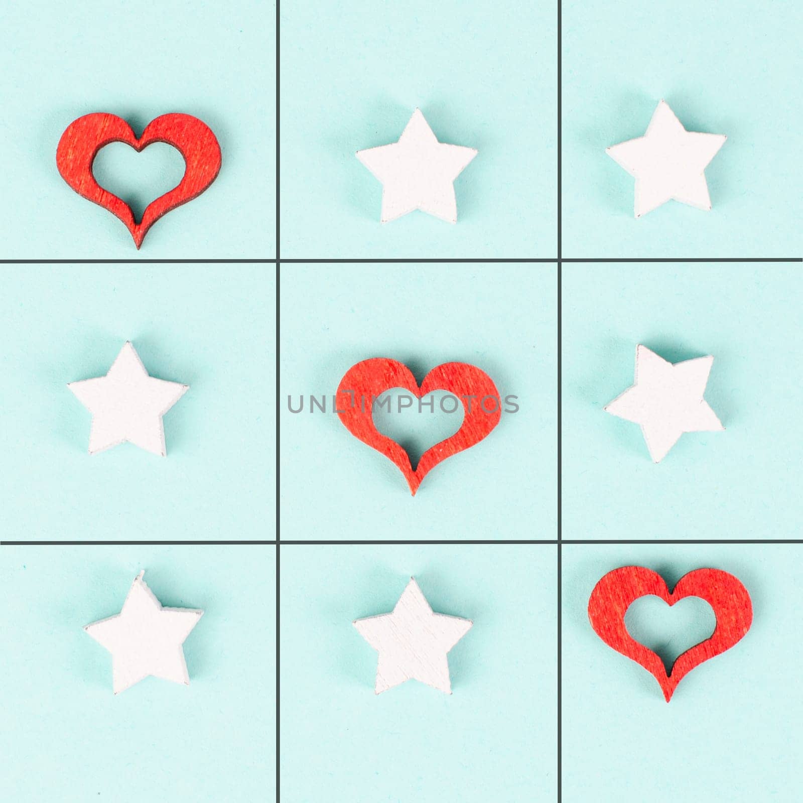 Tic tac toe game with red hearts and stars, symbol for love and emotion, valentines day