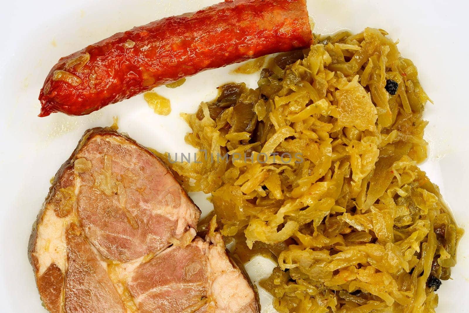 German deli Sauerkraut with sausage and pork meat