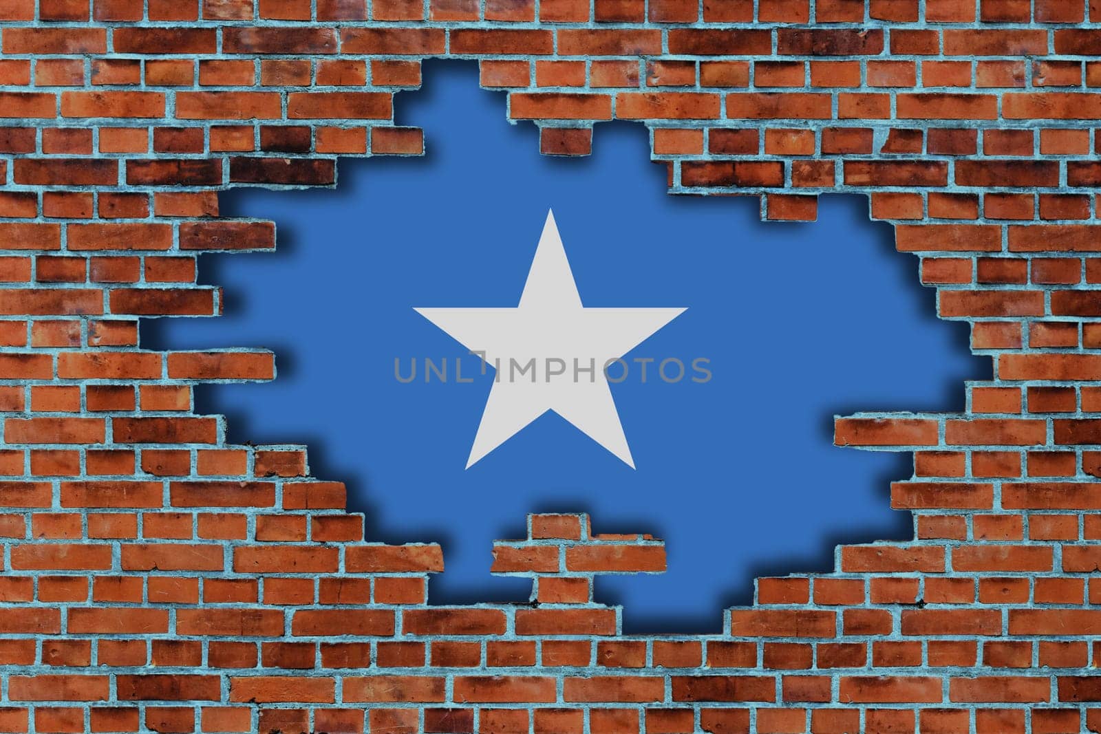 3D Flag of Somalia behind the broken old stone wall background.