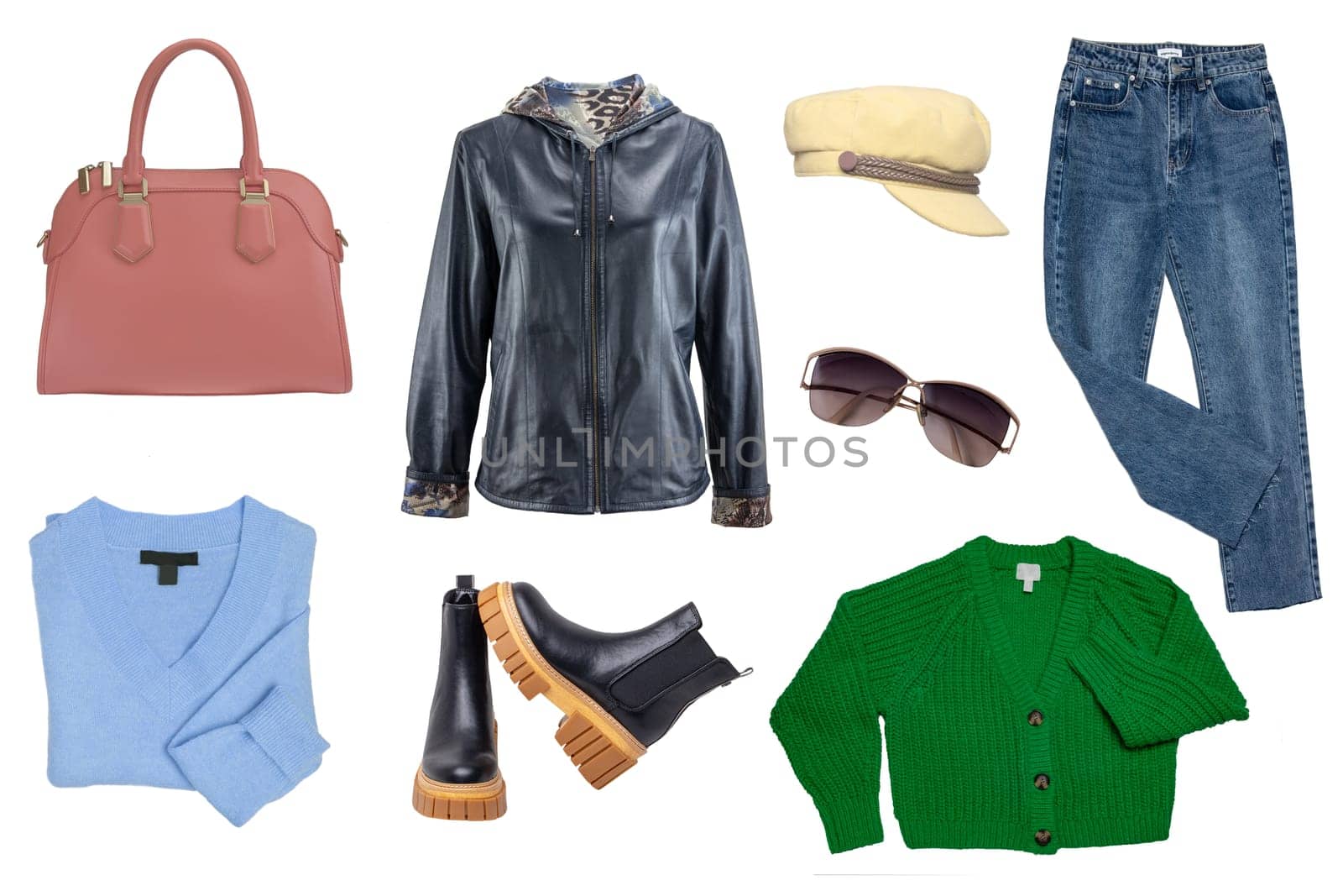 Collage woman clothing. Set of a stylish and trendy leather jacket, boots, jeans, shirt and cardigan, handbag and other accessories isolated on a white background. Latest fashion trends.