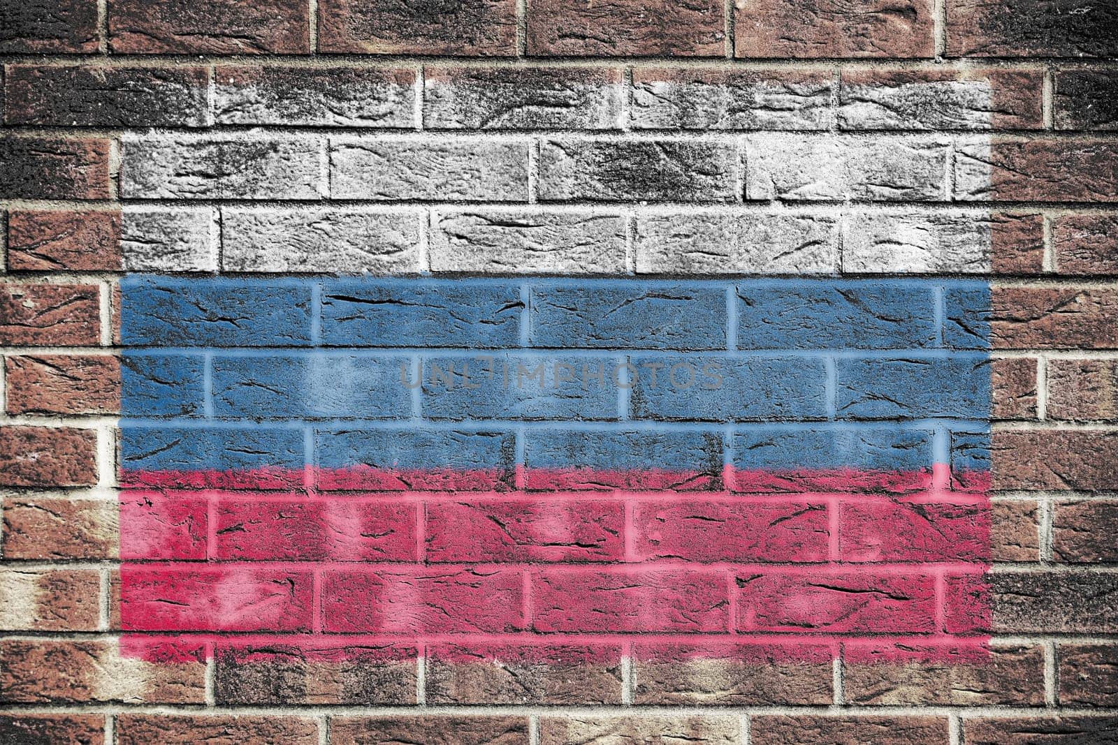 A Russian Federation flag on old brick wall background