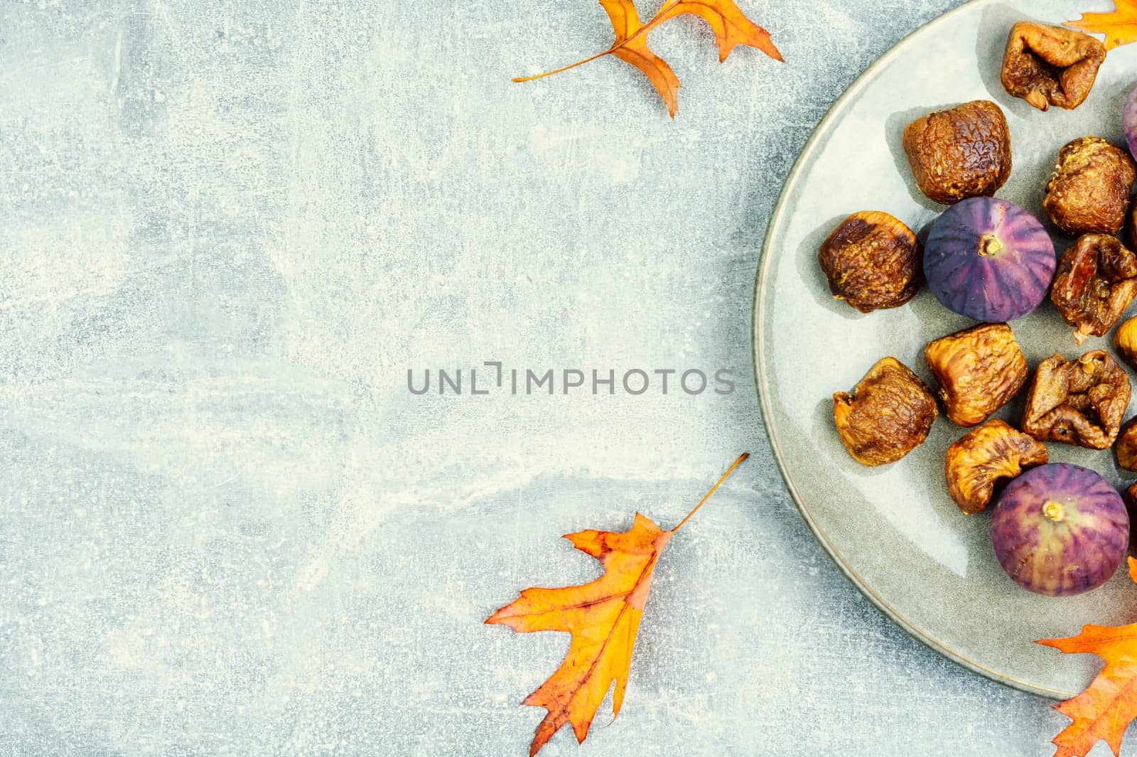 Fig tree fruits, dried figs. Dried fruit, autumn sweet. Flat lay with copy space