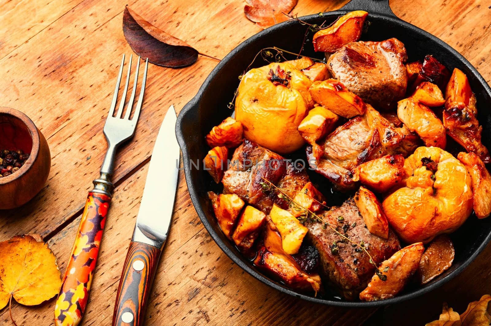 Appetizing pork stew with quince. Autumn recipe