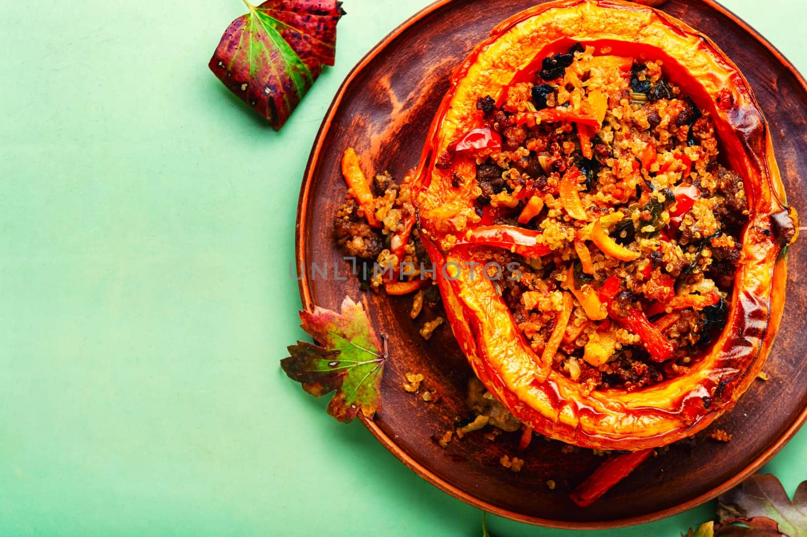 Baked pumpkin stuffed with vegetables, a popular autumn food.