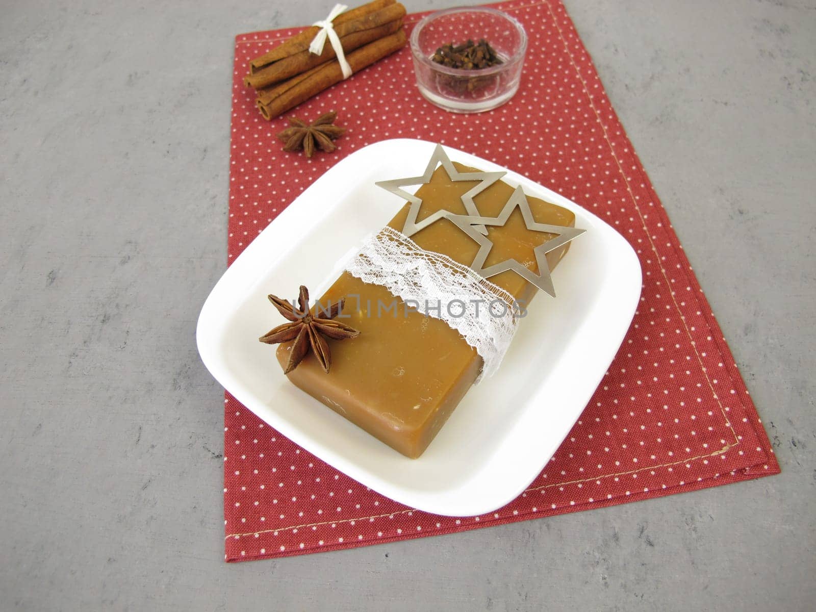 Handmade natural soap bar with Christmas scent of cinnamon, star anise and clove