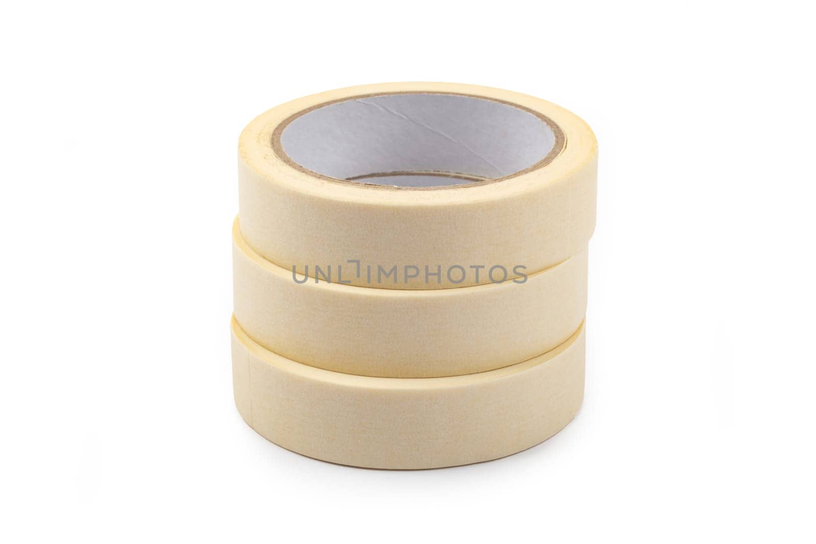 Rolls of beige adhesive Tapes over bright background