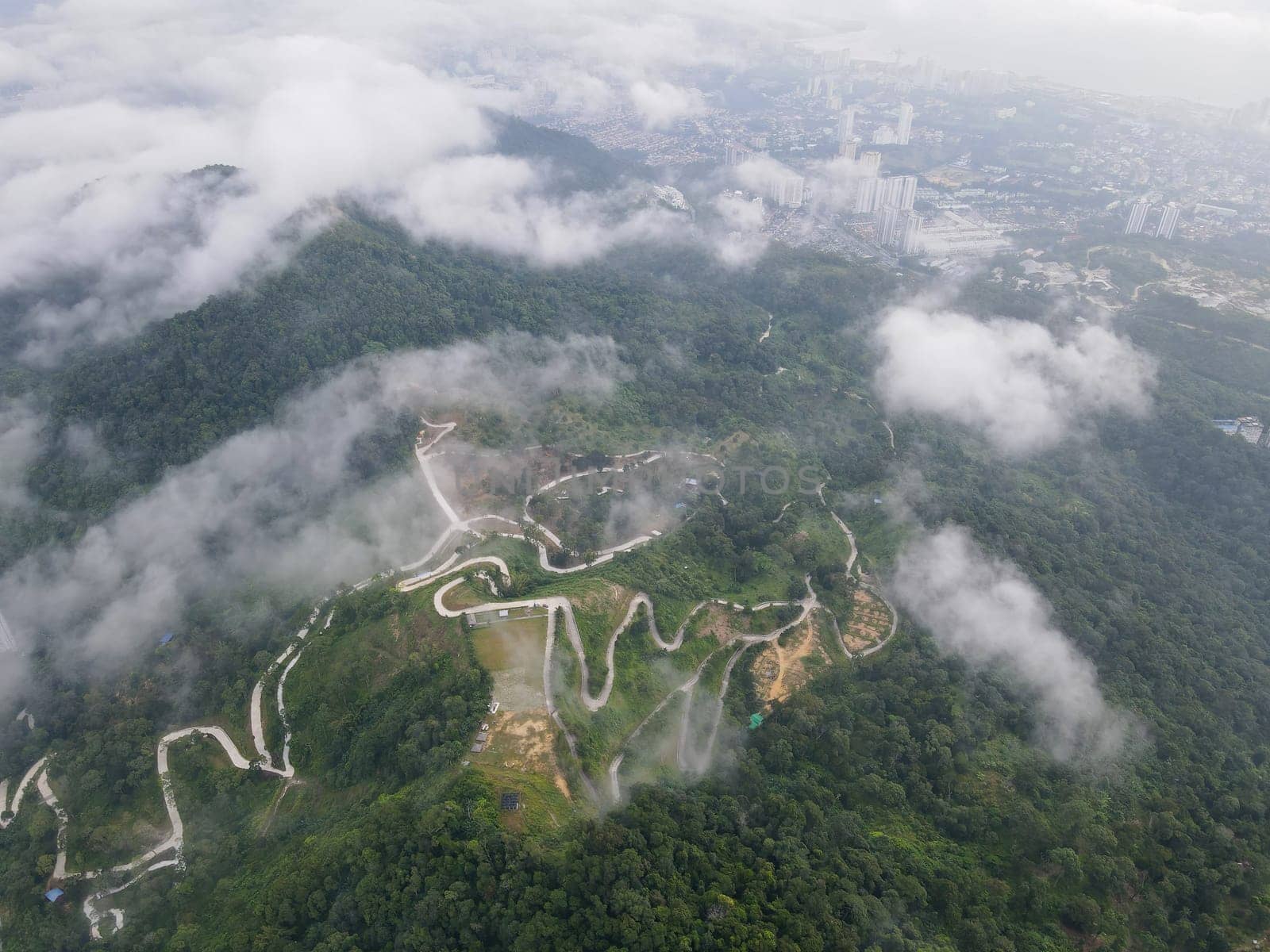 Aerial view rural road at Iconic Hill at Pulau Pinang in rain cloud morning