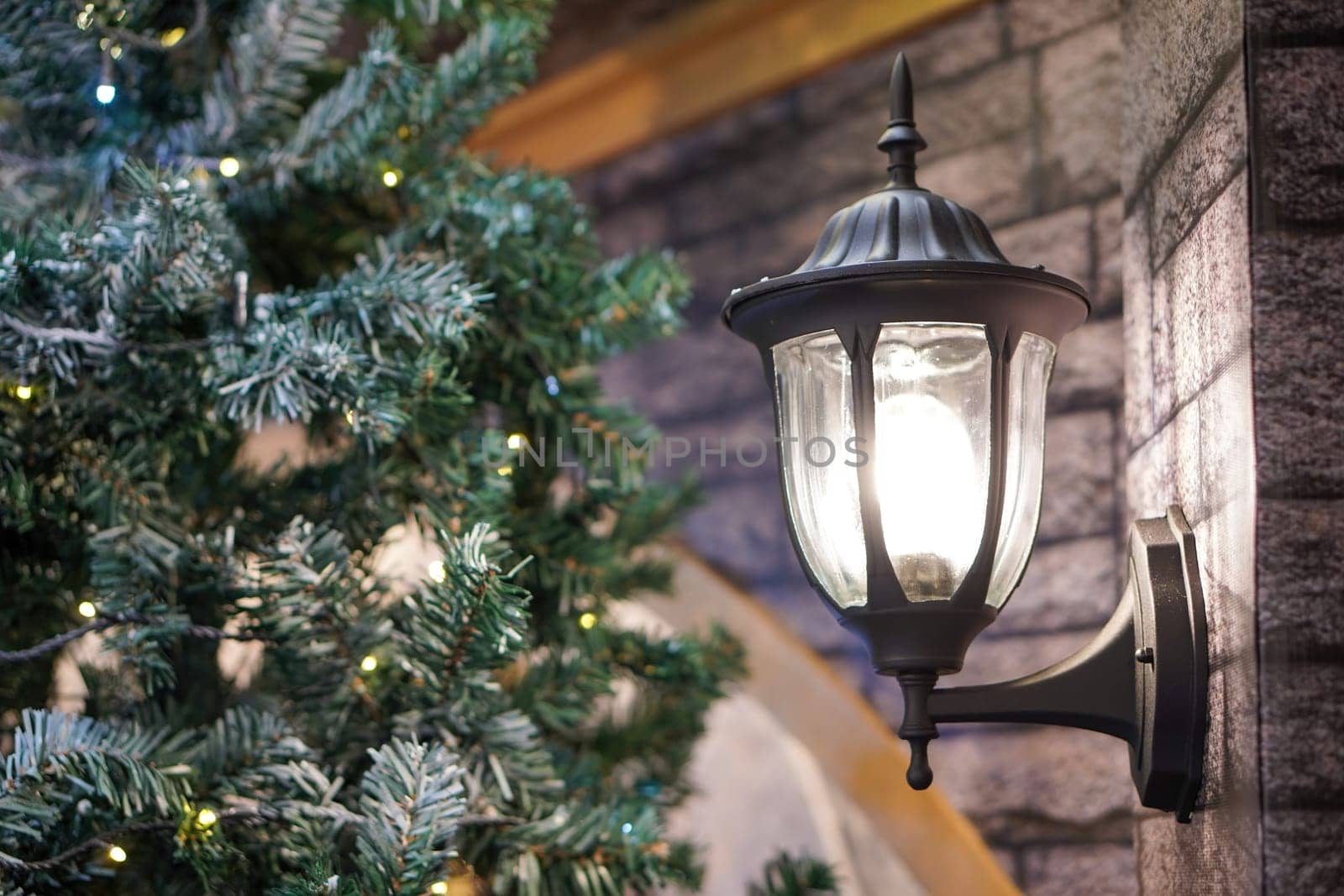 Lamp beside Christmas tree decoration. Christmas, winter holiday concept