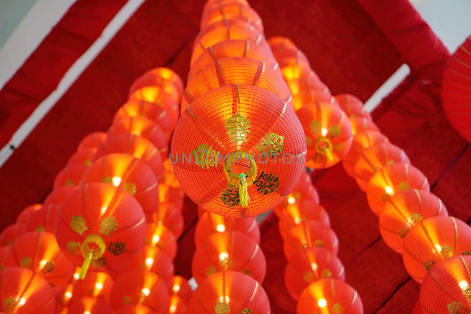Select focus group of red lantern decoration in row