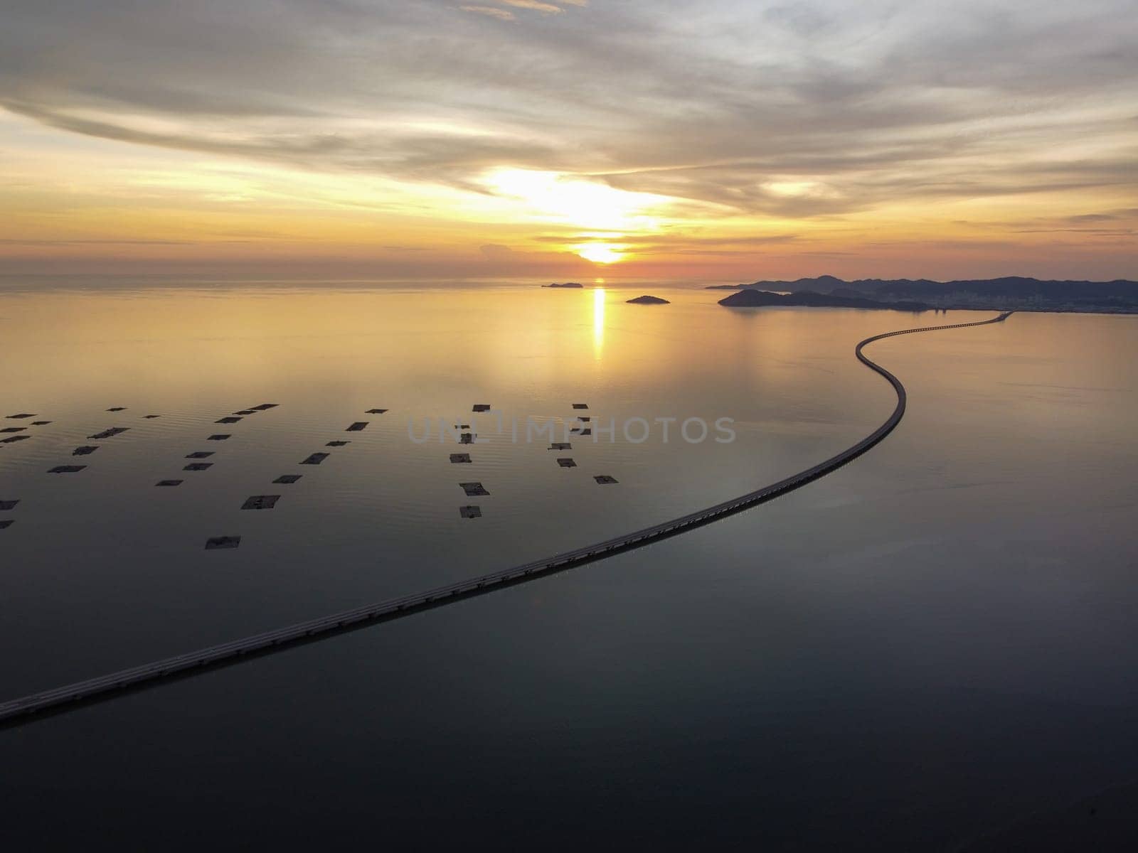 Aerial view Penang Second Bridge in dramatic sunset hour