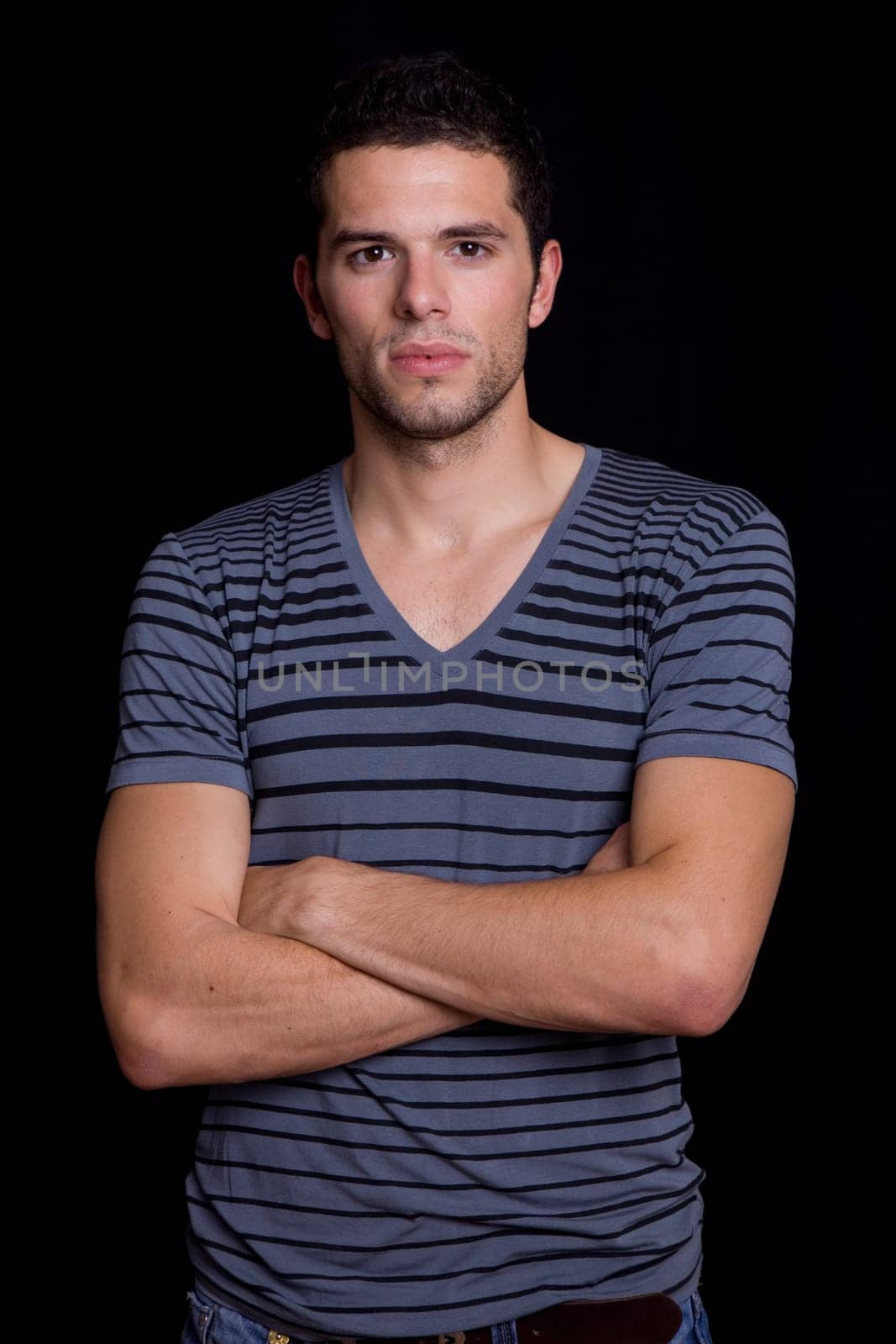young man portrait, on a black background