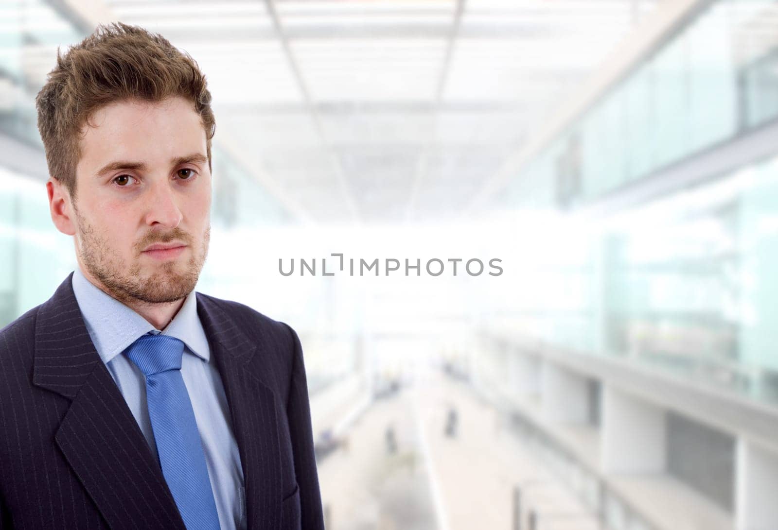 young business man portrait at the office