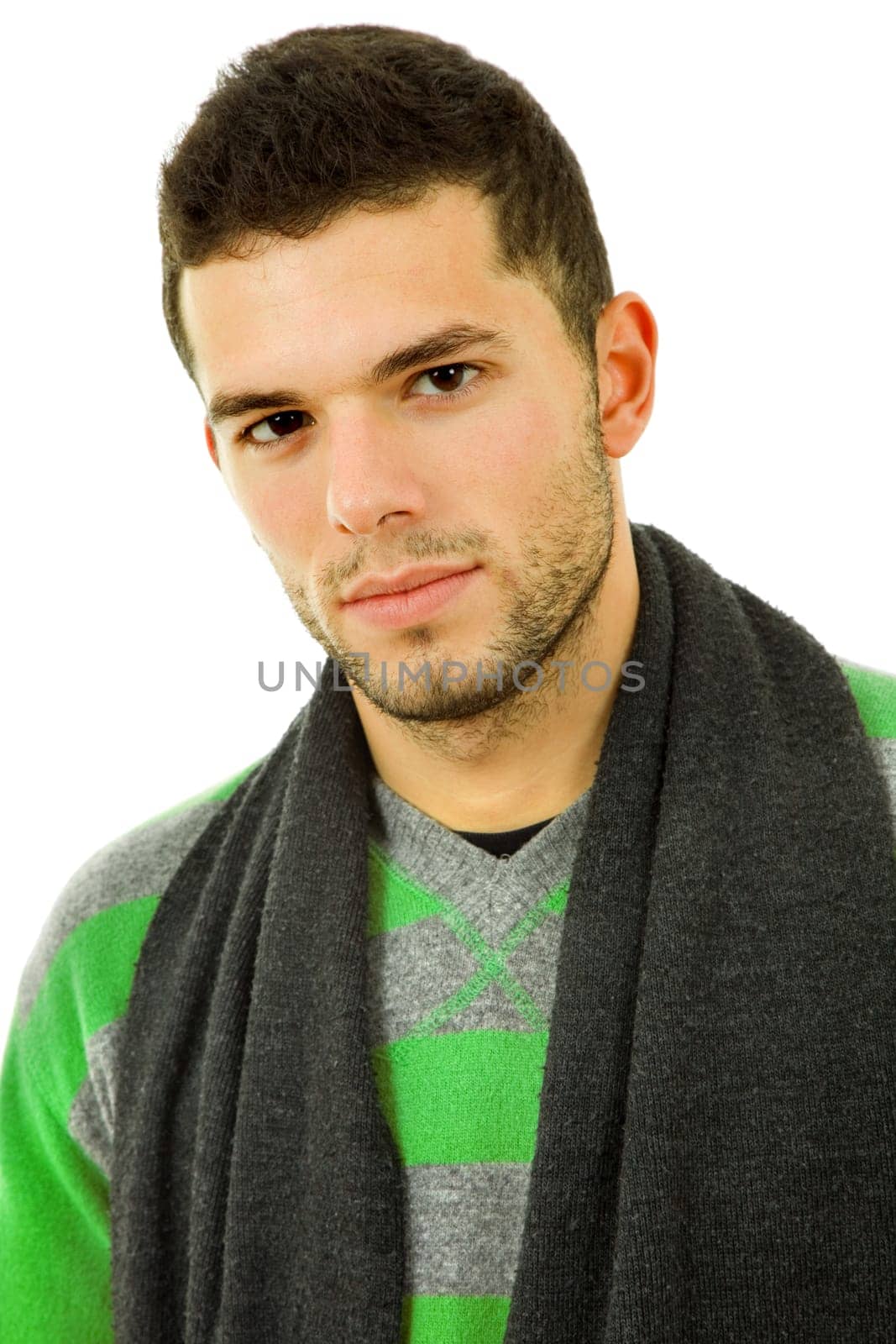 studio picture of a young man dressed for winter
