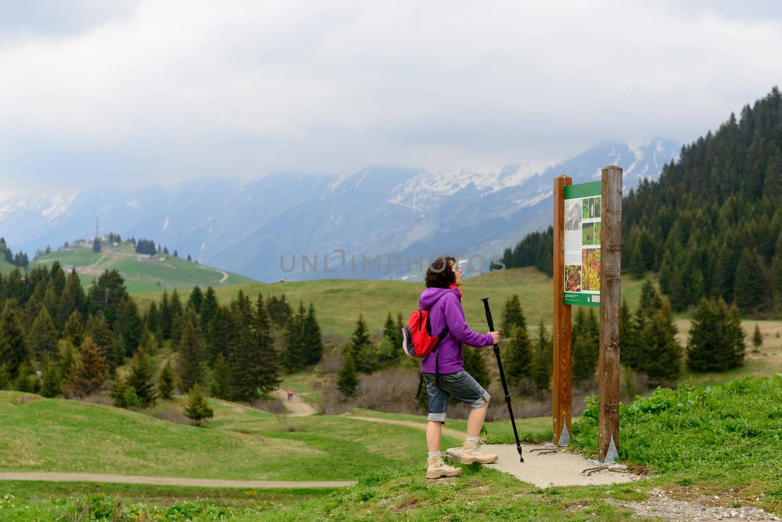 female hiker on a mountain trail
