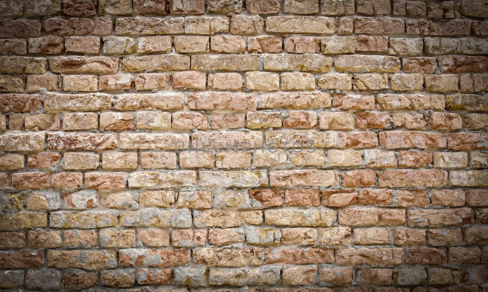 The Old brick wall with white paint background texture close up
