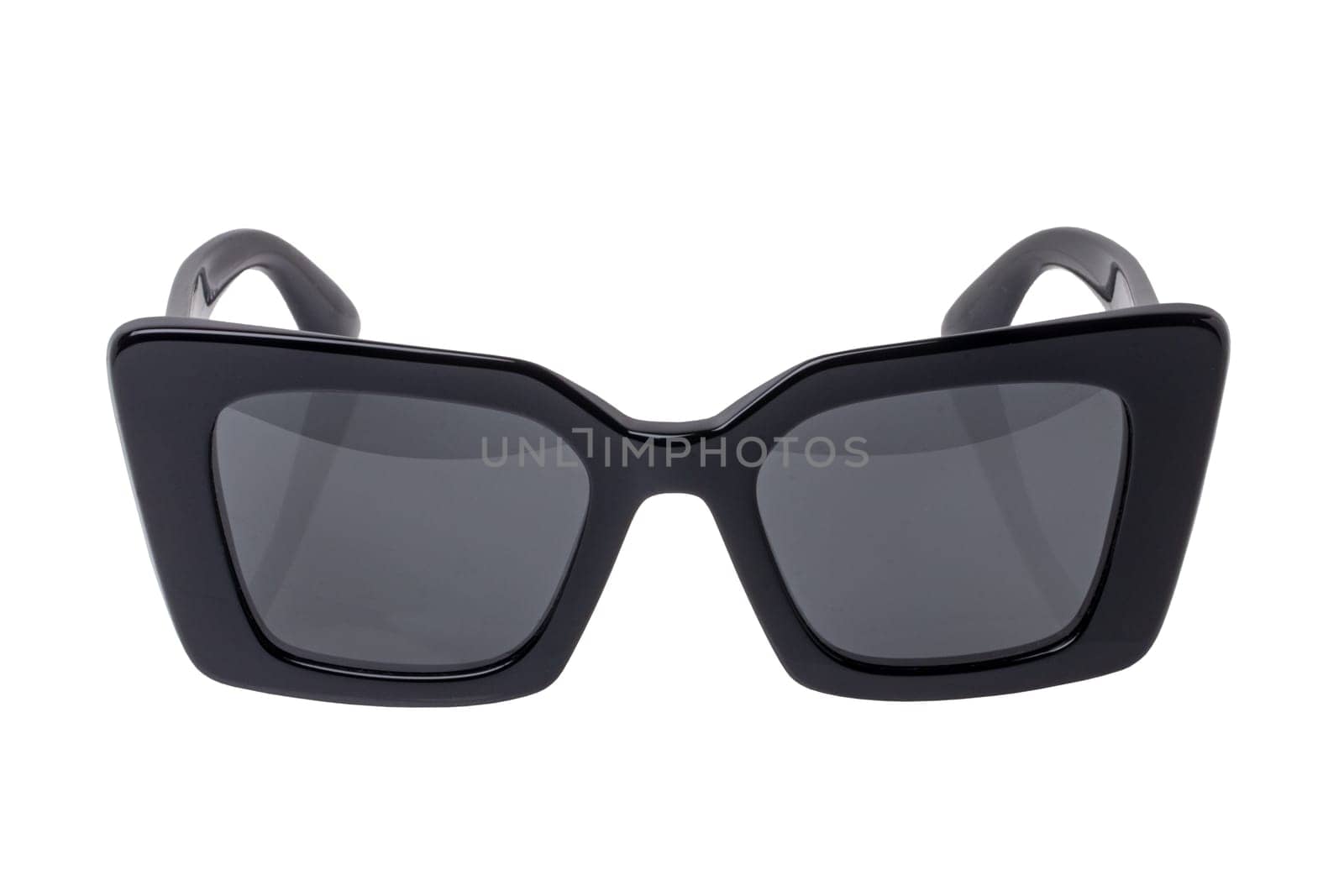 Summer glasses fashion. Female elegant trendy luxury black sun glasses isolated on a white background. Clipping path. Macro.