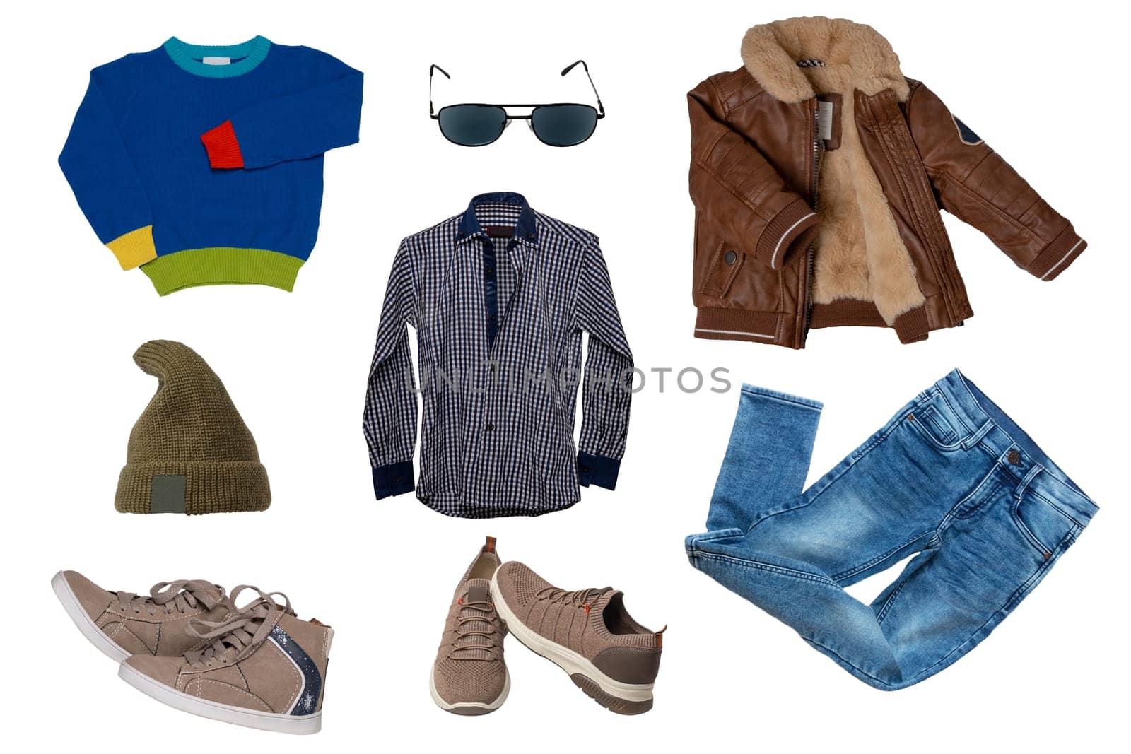 Collage set of little boys autumn clothes isolated on a white background. Denim trousers or pants, boots, sneaker, leather jacket, shirts and a cap for child boy. Children's spring fashion.