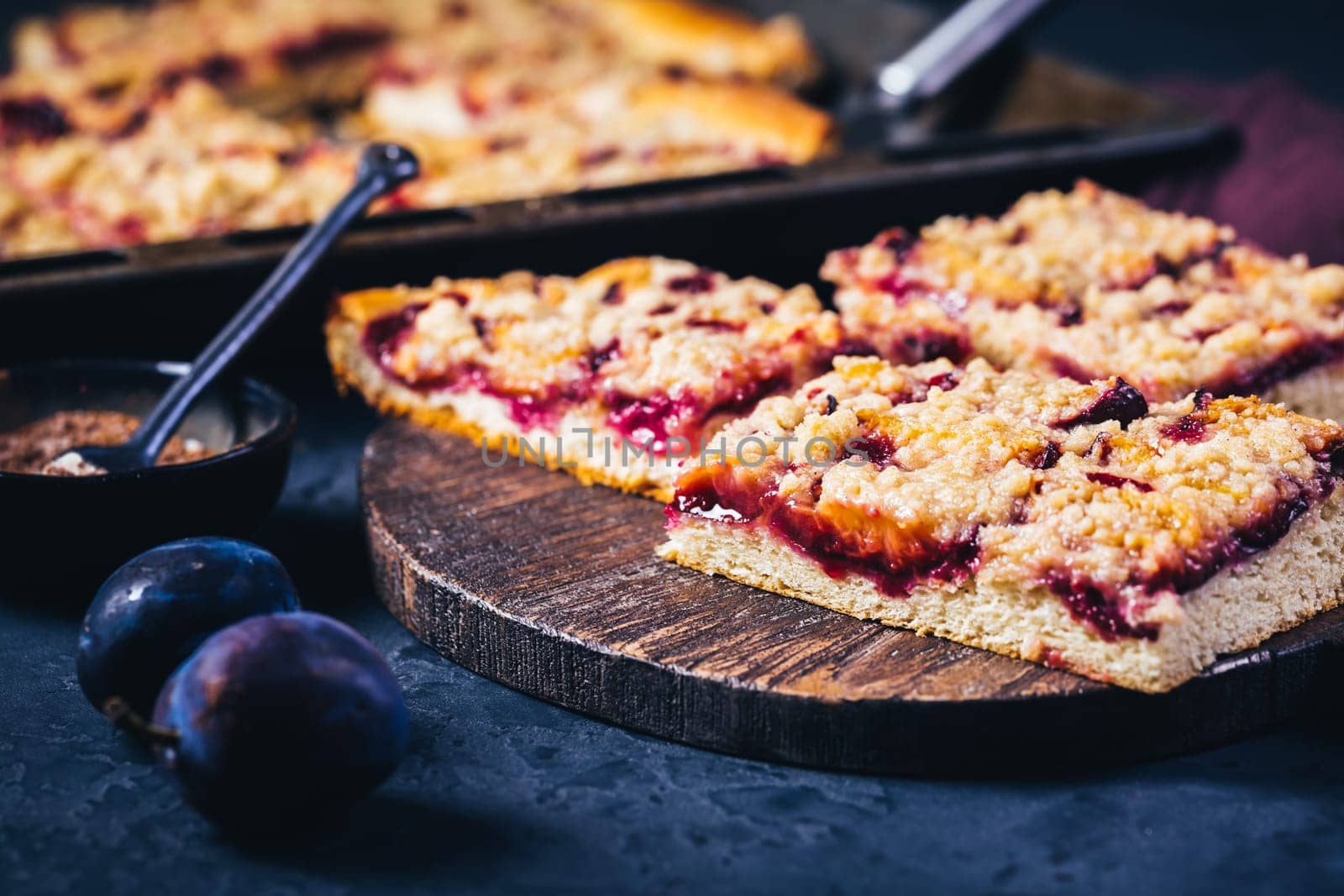 German plum cake (Zwetschgenkuchen) with yeast dough and crumbles