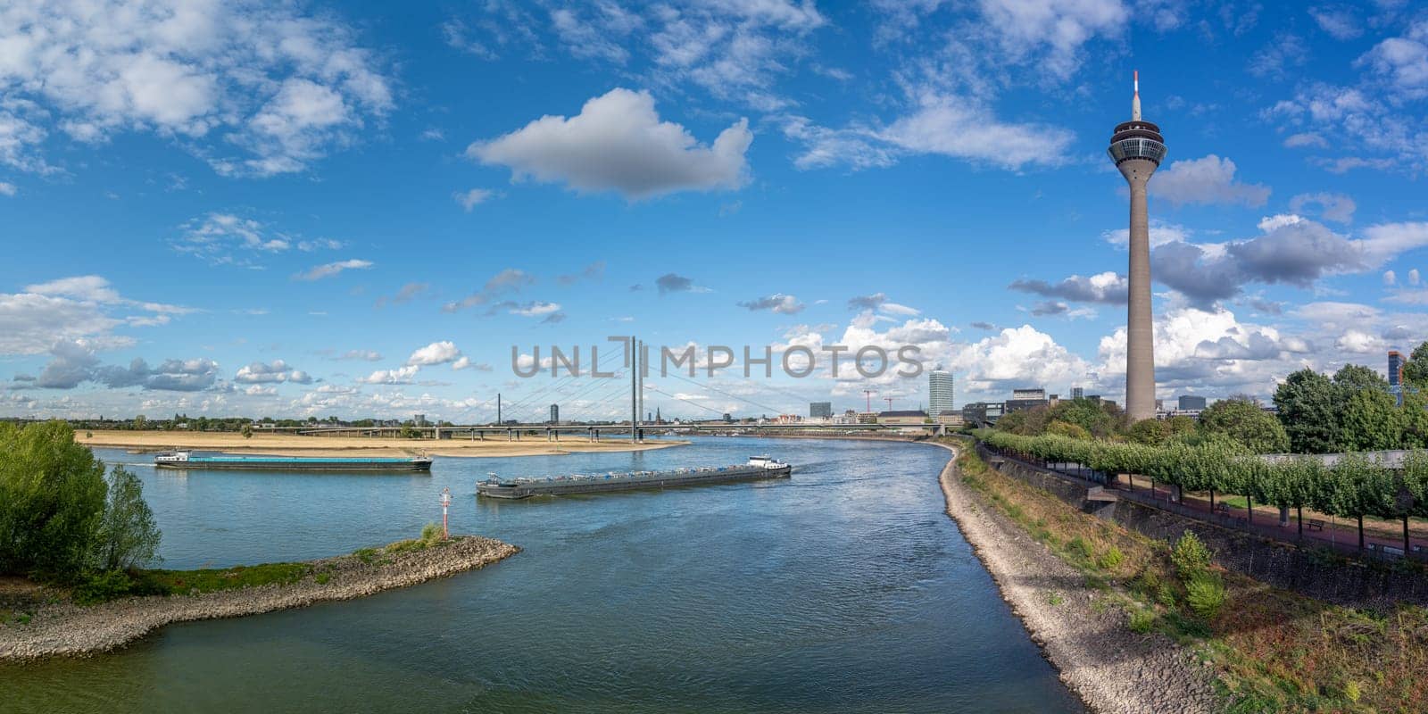 DUSSELDORF, GERMANY - SEPTEMBER 8, 2022: Panoramic image of Rhine river close to Dusseldorf on September 8, 2022 in Germany, Europe