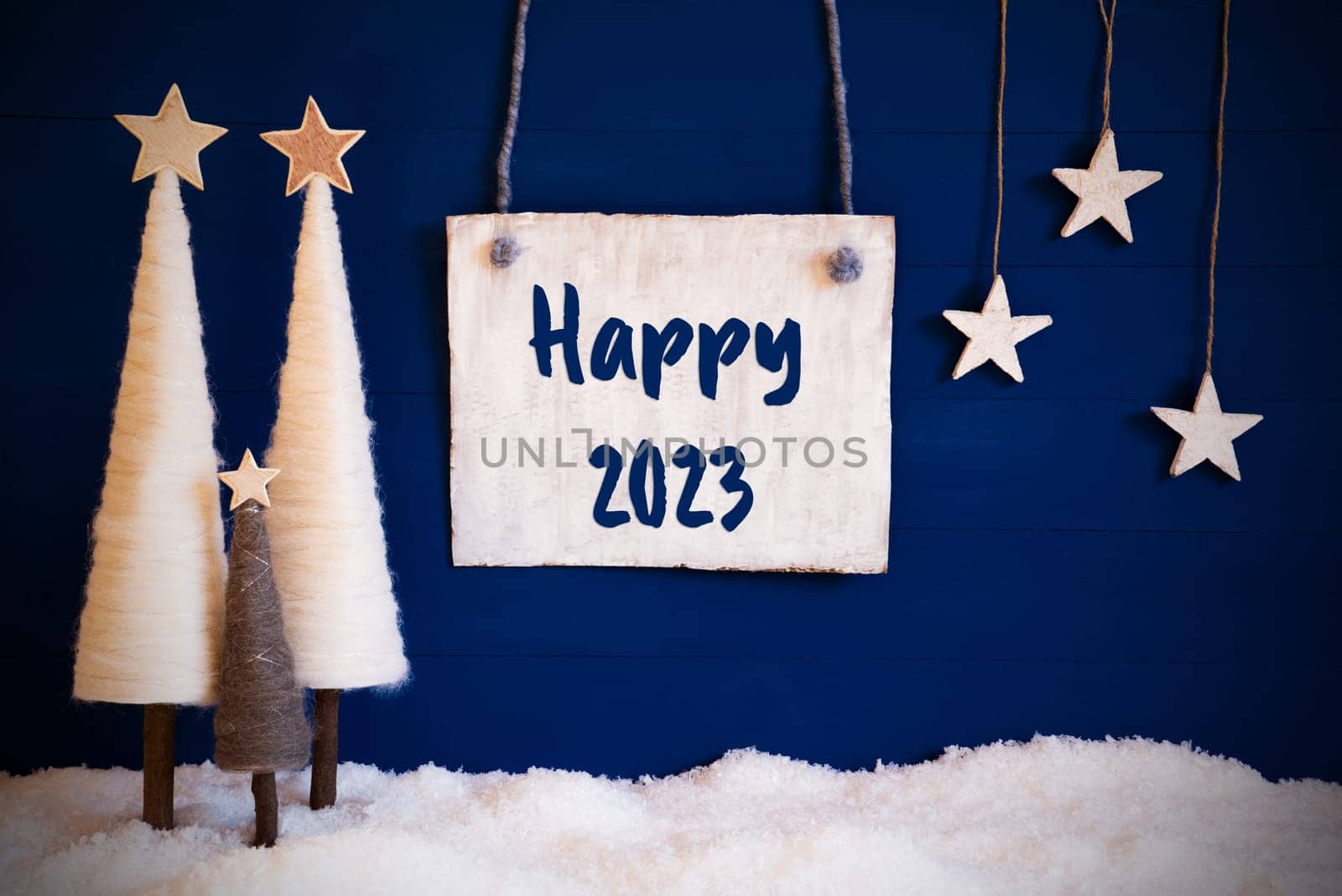 Christmas Decoration Like White Tree With Star On Blue Background. White Snow On Ground. Sign With English Calligraphy Happy 2023