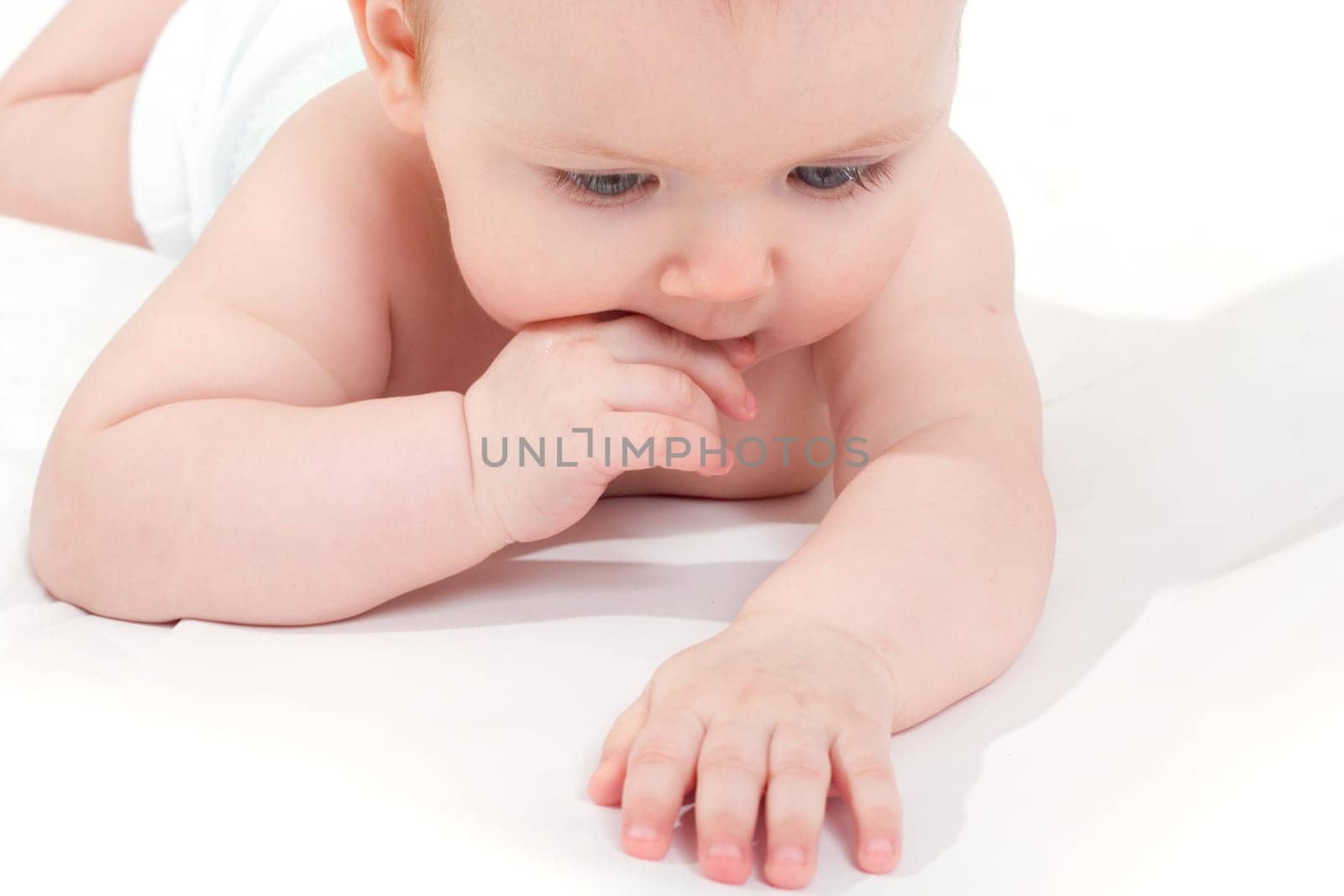 portrait of cute little girl on the white cover