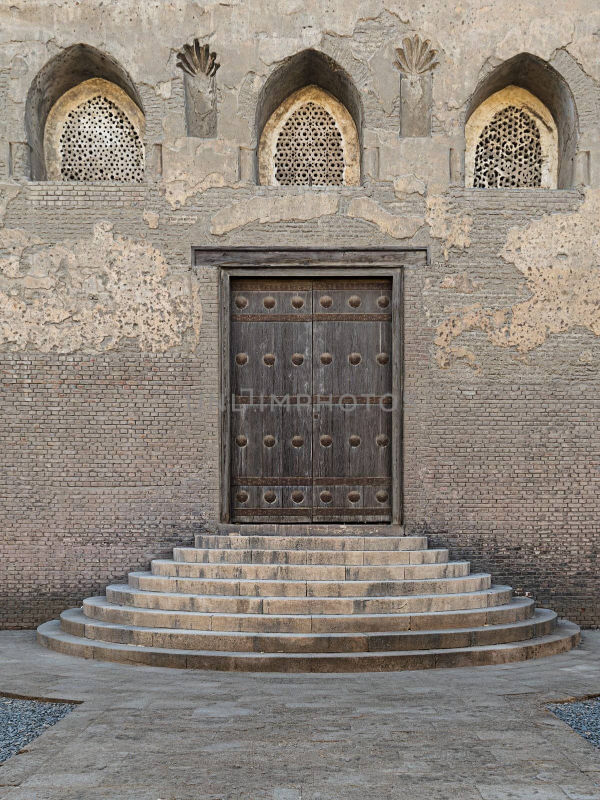 One of the doors of the front courtyard of Ibn Tulun Mosque, the largest mosque in Cairo, Egypt. and may be the oldest mosque in the city with its original form