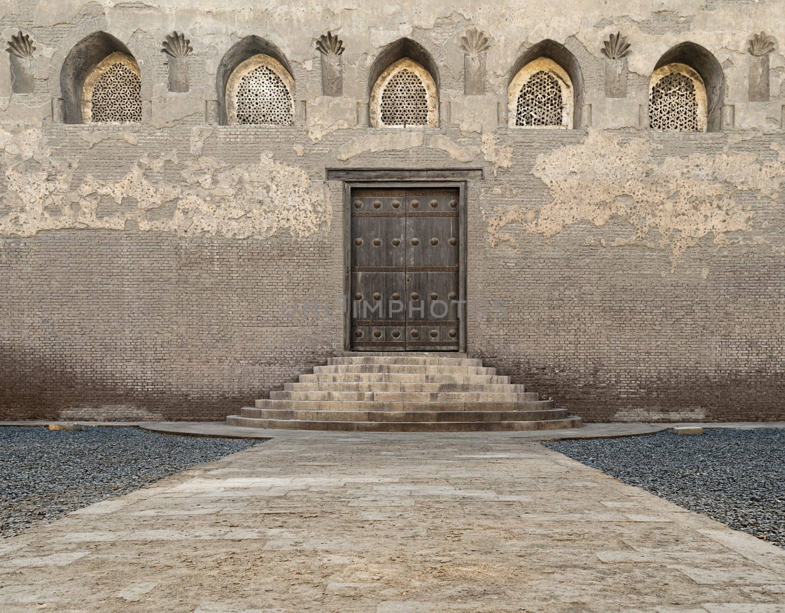 One of the doors at the front courtyard of Ibn Tulun Mosque, the largest mosque in Cairo, Egypt. and may be the oldest mosque in the city with its original form