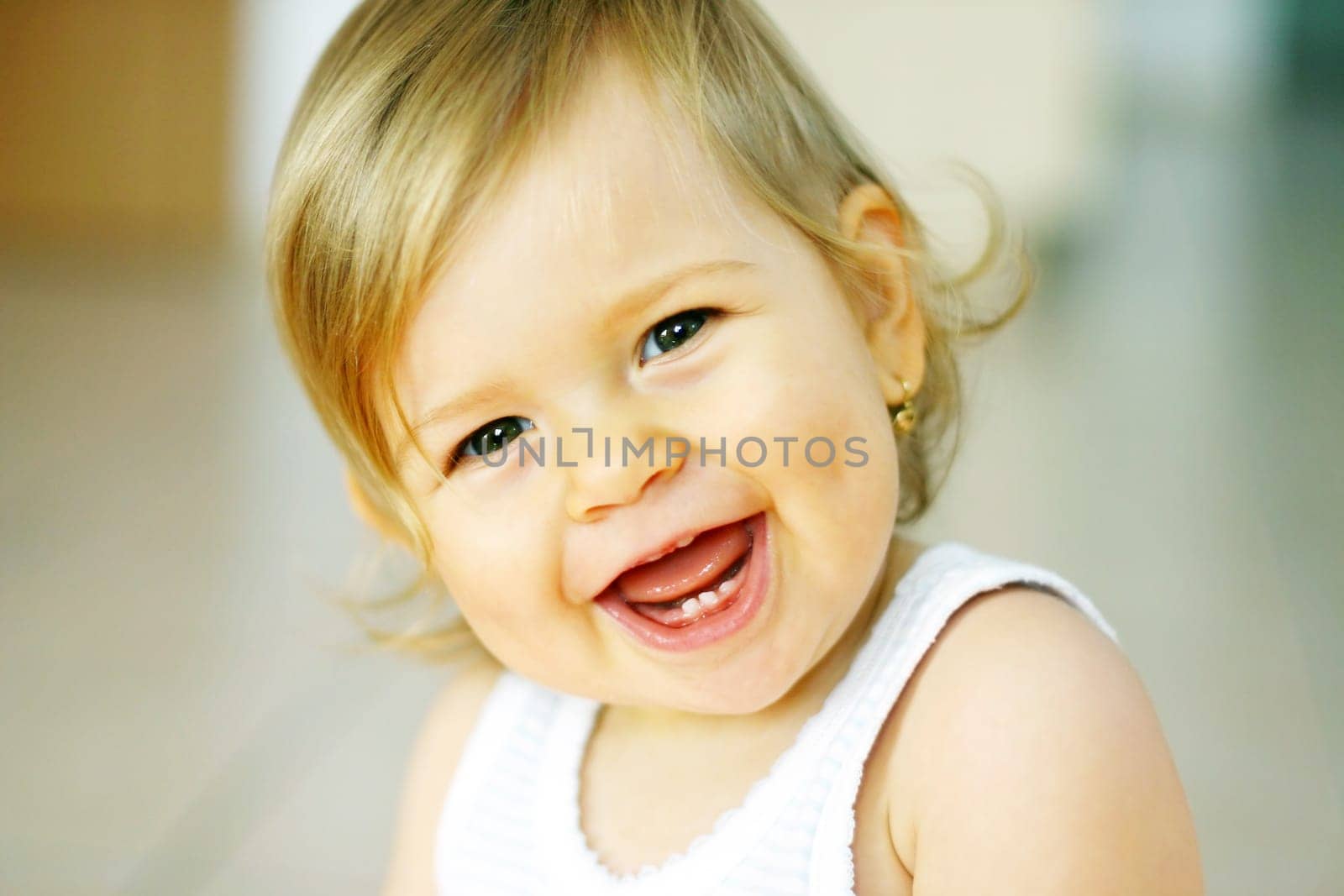 Small baby is laughing
