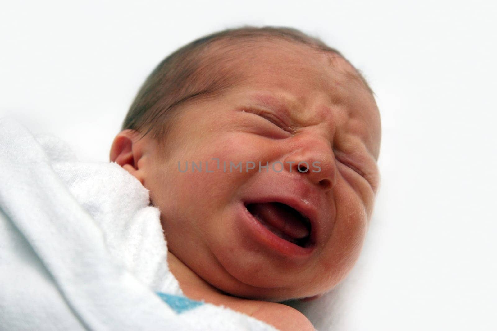crying baby on his first day in a hospital