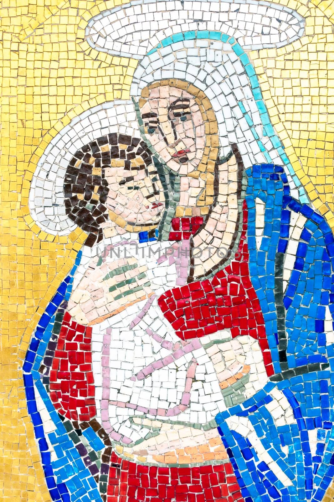 Colorful mosaic representing Mary with the baby Jesus.