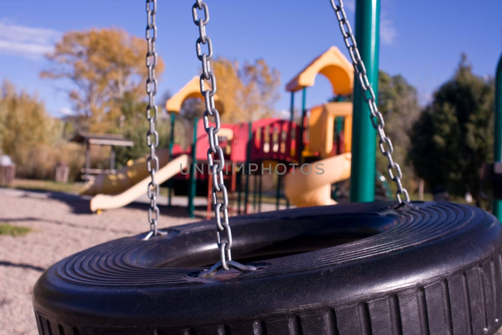 a tire swing at the playground