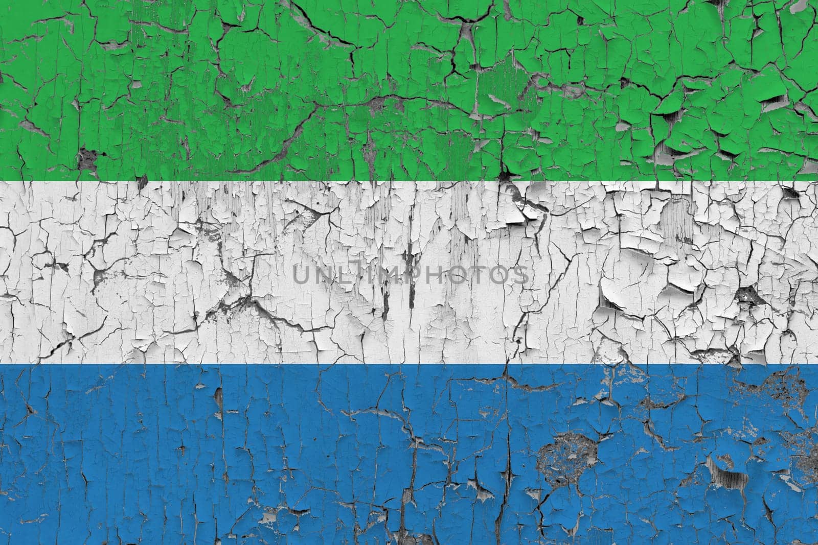3D Flag of Sierra Leone on an old stone wall background.